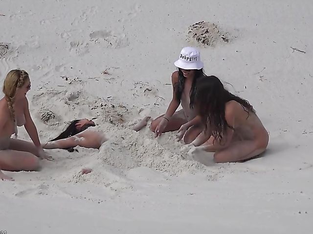 Four sexy nude girls play in the dunes 