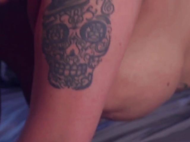 Busty tattoo babe Heidi doing porn with her man