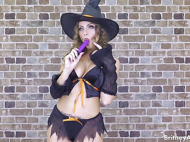 Busty solo with a purple toy on Halloween with Britney Amber