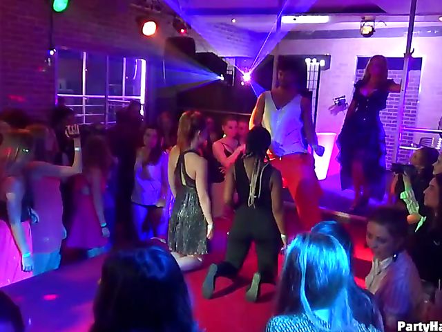 Drunk girls go wild in the club with a stripper