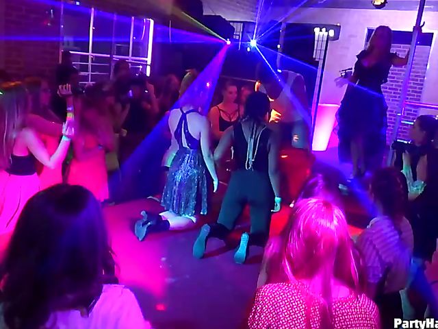 Drunk girls go wild in the club with a stripper