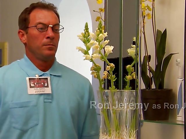 Carmen Hart in black boots and lingerie rides a cock in bed