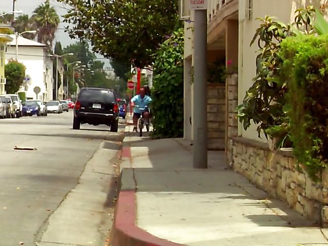 Carmen Hart in black boots and lingerie rides a cock in bed