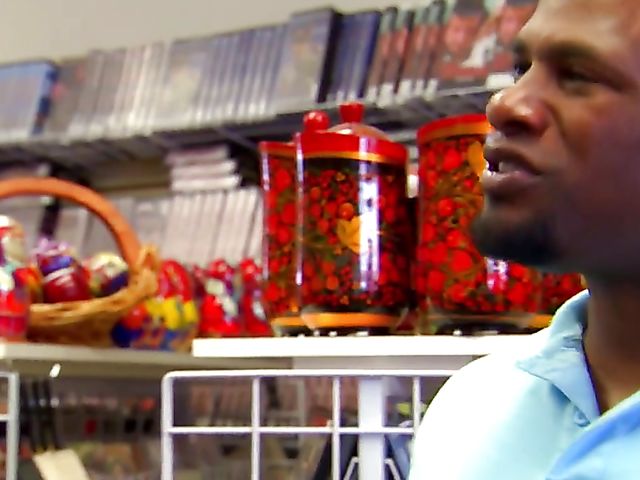 Carmen Hart in black boots and lingerie rides a cock in bed