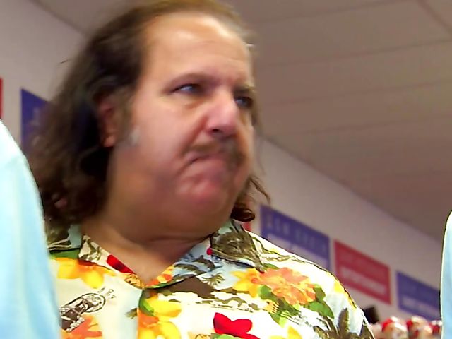 Carmen Hart in black boots and lingerie rides a cock in bed