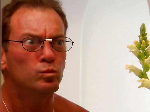 Carmen Hart in black boots and lingerie rides a cock in bed