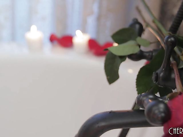 Emma Hix - Solo fingering in the bathtub with a red rose 