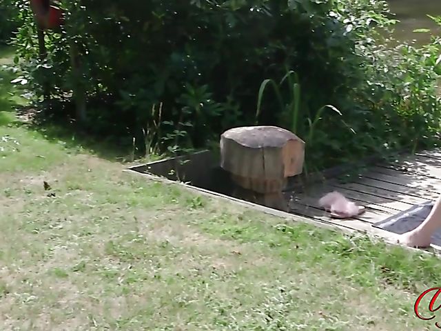 Brook Logan gets naked for a peeping tom by the lake