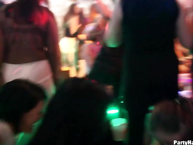 Drunk girls dance and suck in the club