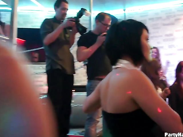 Drunk girls dance and suck in the club