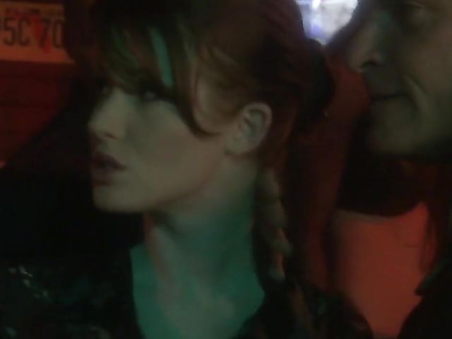 Hot redhead Nikki Rhodes gets tales two dicks at the bar