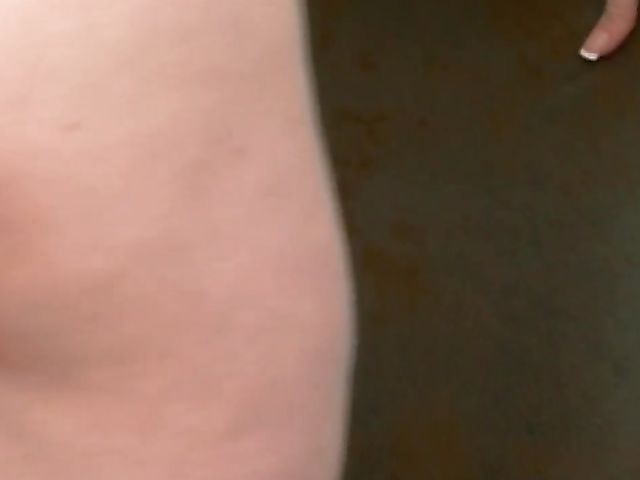 Solo redhead Nicole Hart posing in lingerie and fingering