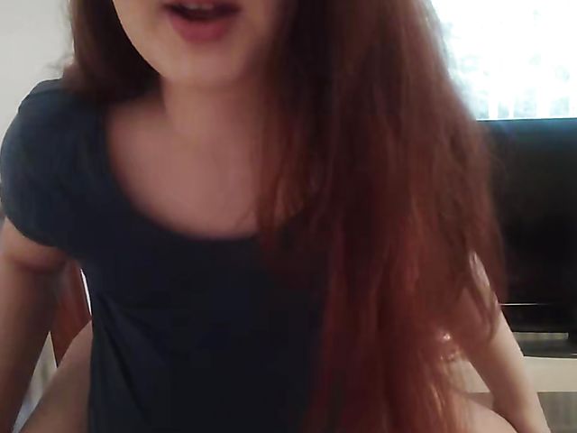 Red-haired webcam girl with monster tits masturbates 