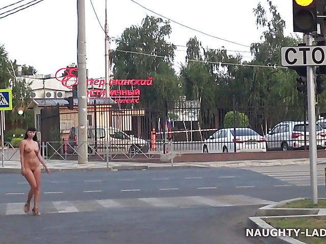 Busty babes' public nude walk in the city