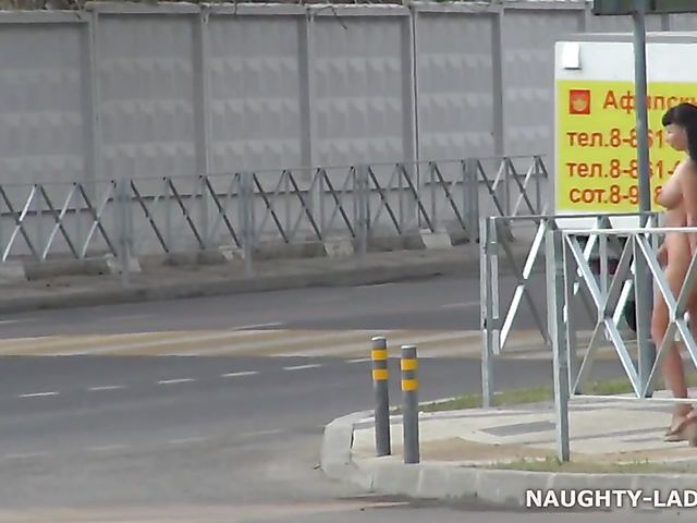 Busty babes' public nude walk in the city