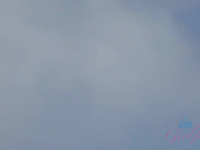 Hairy girlfriend Niki Snow is naked on the beach