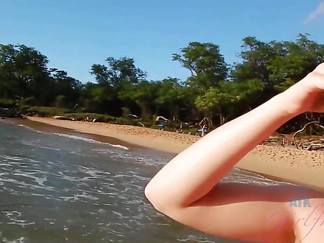 Hairy girlfriend Niki Snow is naked on the beach