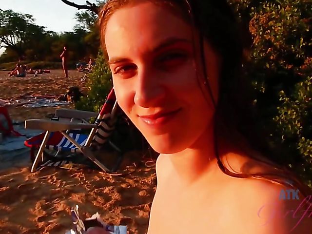 Hairy girlfriend Niki Snow is naked on the beach