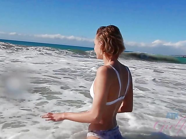 Bikini beach girl Emma Hix gets naughty
