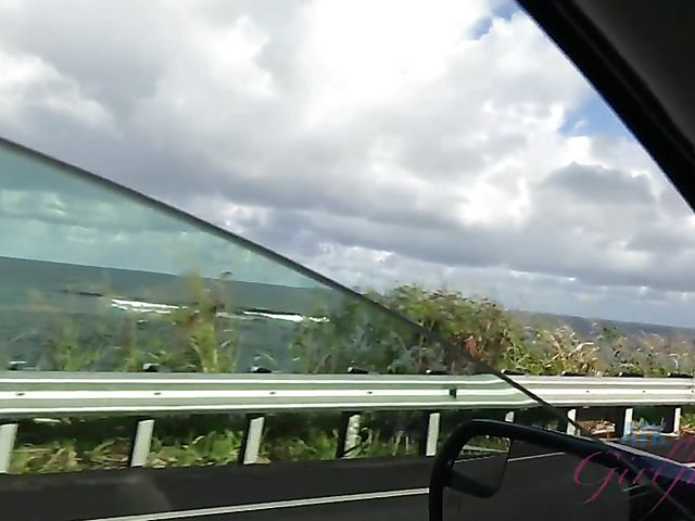 Naughty teen shows her twat in the car