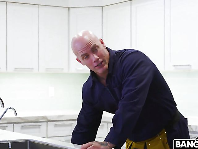 MILF Nikki Benz shows her huge tits to a lucky plumber