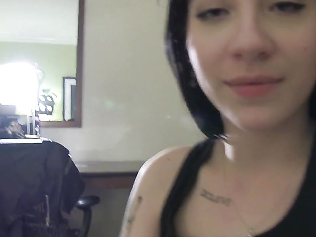 Goth girl Nikki Hearts fucks her lesbian girlfriend with a strap-on