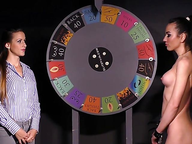 Lez femdom whipping with a hot nude slavegirl