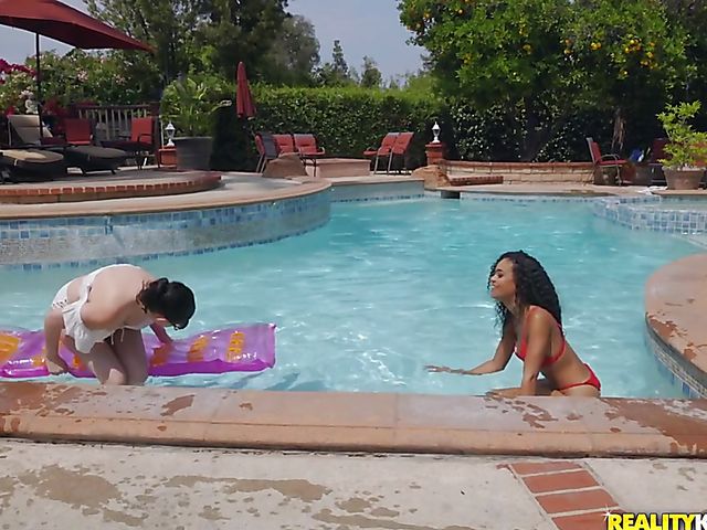 Poolside interracial lesbian love with busty Autumn Falls and Scarlit Scandal