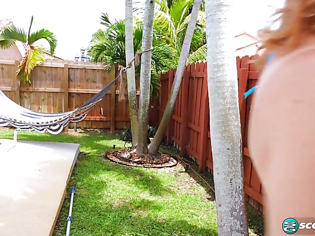 Chubby bikini girl Jenni Noble plays with her gigantic tits and pussy in the backyard