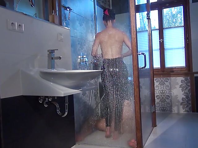 Female domination and latex worship in the shower with dominatrix Susi