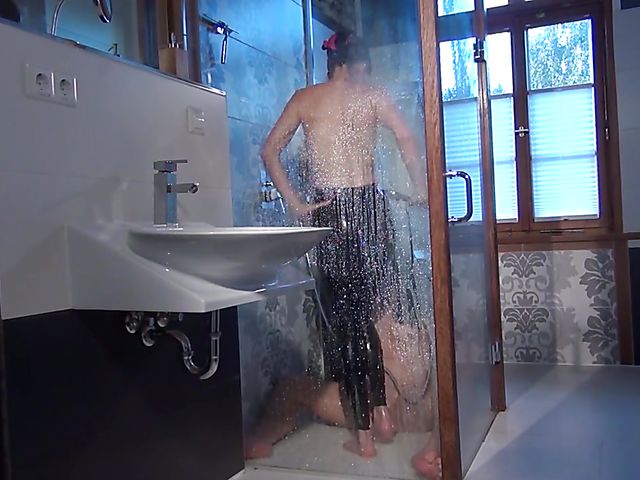 Female domination and latex worship in the shower with dominatrix Susi