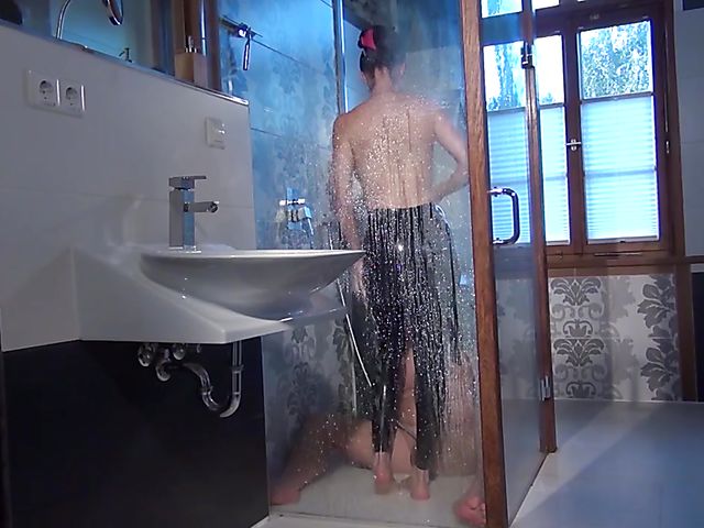 Female domination and latex worship in the shower with dominatrix Susi