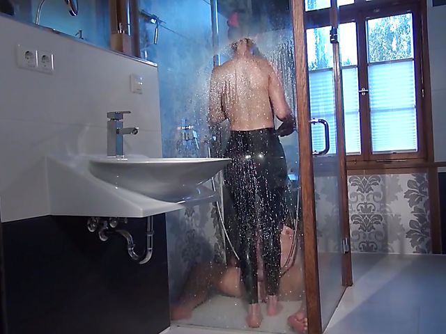 Female domination and latex worship in the shower with dominatrix Susi