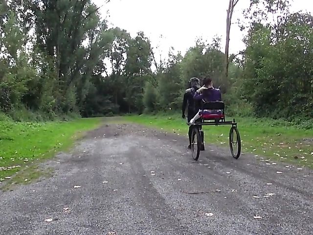 Human pony training outdoors with Mistress Susi's rubber slave