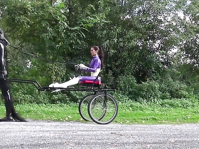 Human pony training outdoors with Mistress Susi's rubber slave