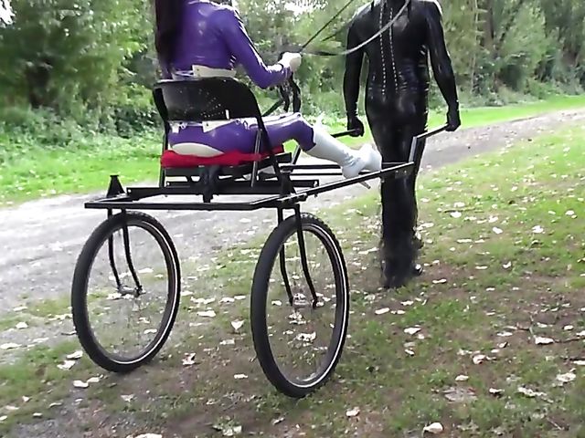 Human pony training outdoors with Mistress Susi's rubber slave