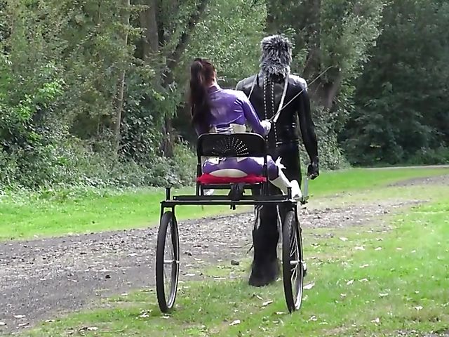 Human pony training outdoors with Mistress Susi's rubber slave