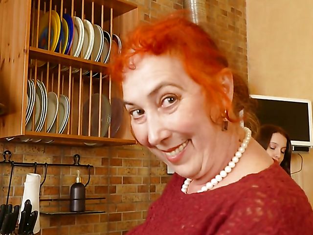 Lesbian old and young fisting and strapon session in the kitchen