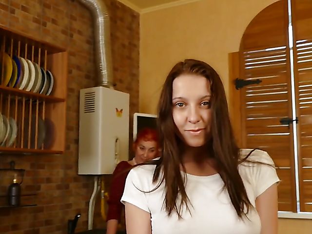 Lesbian old and young fisting and strapon session in the kitchen