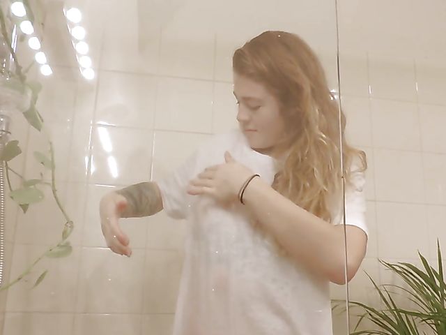Tattoo girl Pixie Faye takes off her wet clothes for shower masturbation