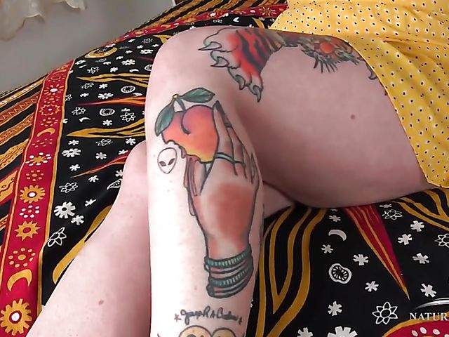 Plump hairy redhead Adora Bell shows her tattoos and bush 