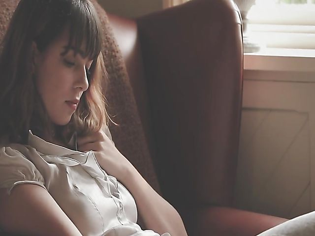 Erotic solo with bookworm Daisy Steel fingering and vibrating her snatch in her chair