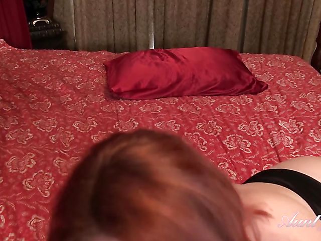 Roux - Redheaded mature fingering her snatch