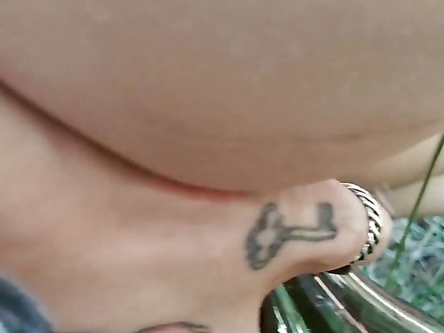 Champagne bottle insertion outdoors on a picnic  