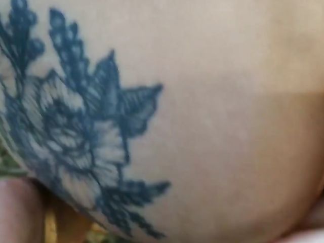 Champagne bottle insertion outdoors on a picnic  