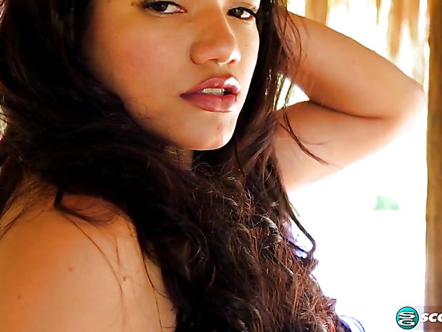 Oiled up big tits latina Ana Montes takes off her mini bikini