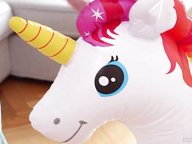 Masturbating teen Adelle Unicorn rubs her pussy against unicorn's horn