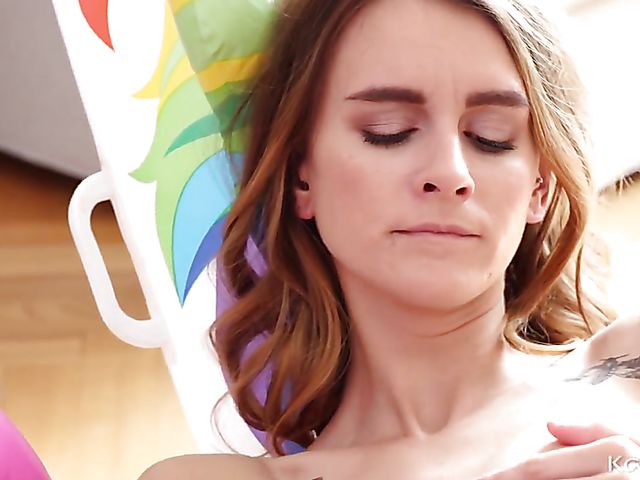 Masturbating teen Adelle Unicorn rubs her pussy against unicorn's horn