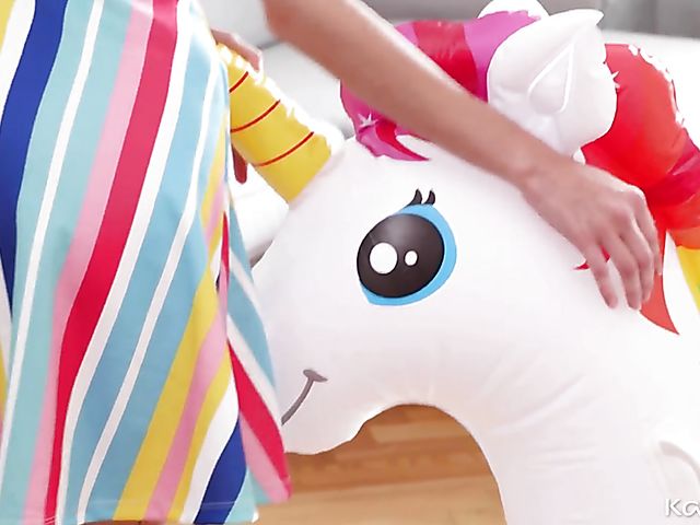 Masturbating teen Adelle Unicorn rubs her pussy against unicorn's horn