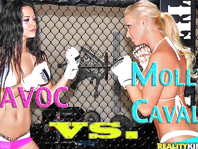 Two sexy rounds of lesbian wrestling with oiled up Moni and Molly Cavalli